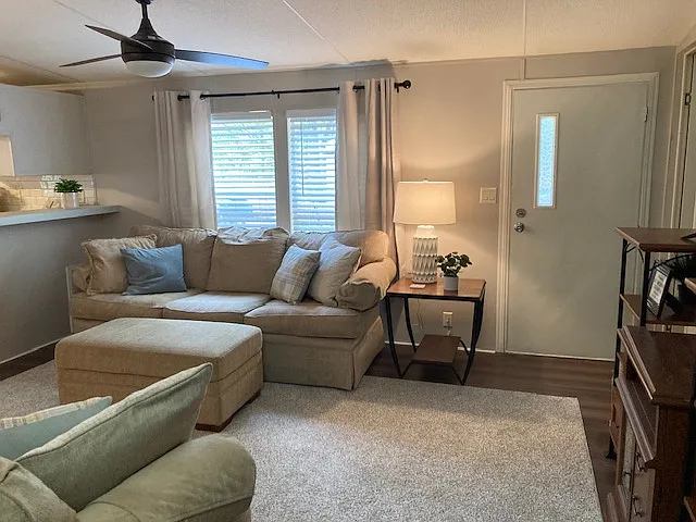 Note: This property is NOT furnished. This photo is just to show how furniture can fit in living room: Full and Love seat couches along with side tables and TV Stand.