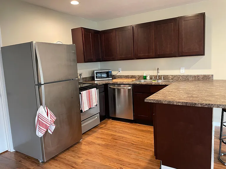 Fully equipped kitchen. Dishwasher, stove, microwave, refrigerator, K-cup coffee maker, and all utensils/cookware included. *Not pictured - utility room with washer and dryer included.
