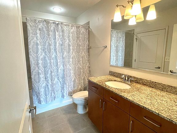 Tile Floor, Granite Countertop & Deep Soak Tub