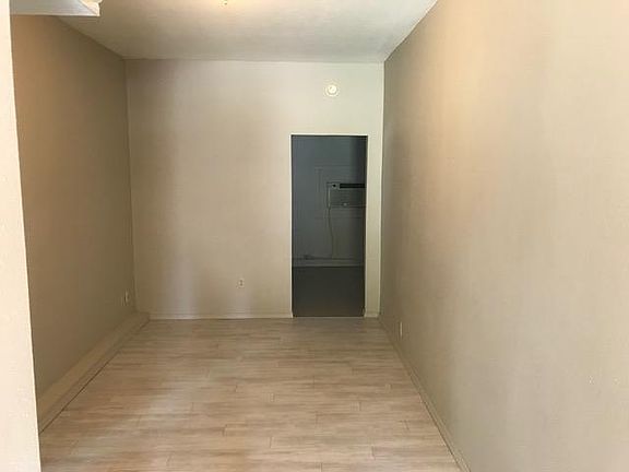 living area has brand new nice hardwood flooring and paint 1