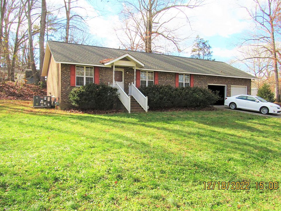 Brick House with front and side yards
