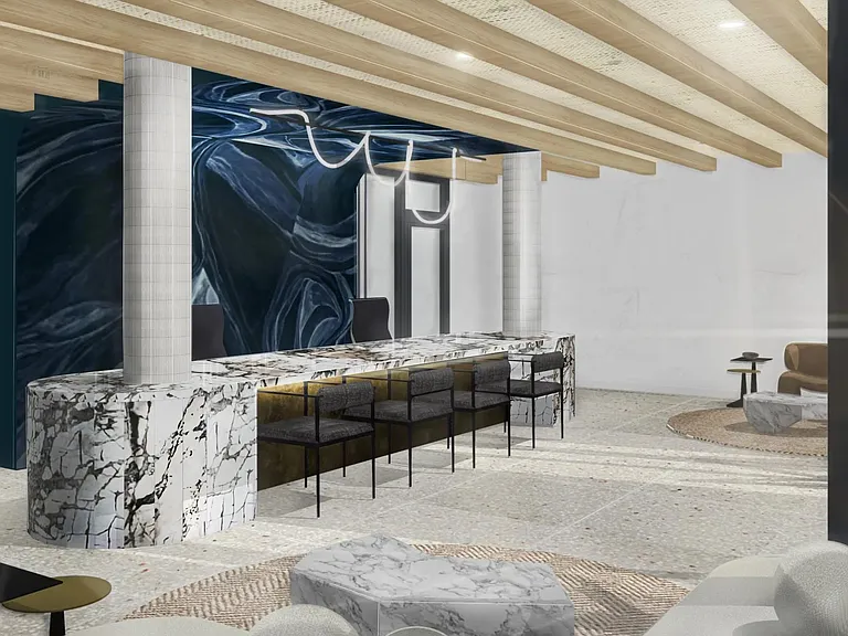 A striking leasing lounge welcomes you home with statement stone, layered seating, and art-driven design.