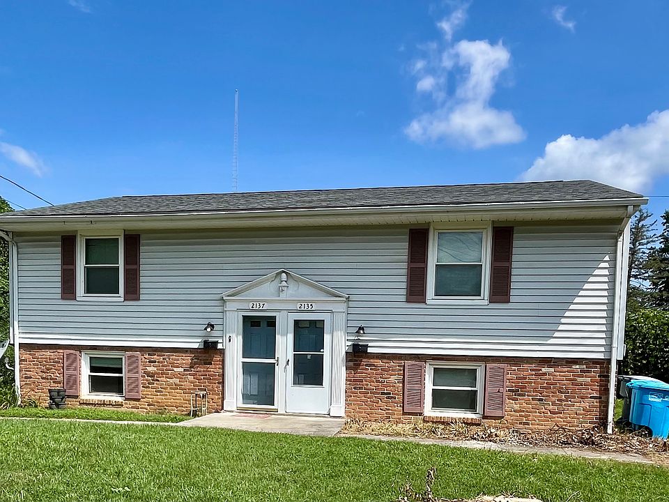 Front Exterior. Apartment is the top floor.