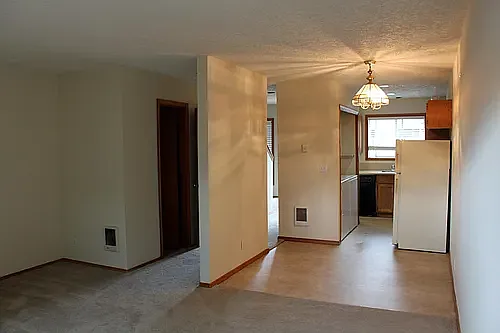 Old photo of 436 unit but the layout is the same! Updates in unit 434 with wood laminate floors and new light fixture.