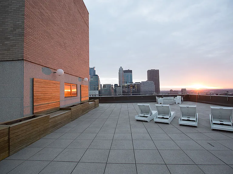 360 degree rooftop with views of the river and downtown from the 29th floor! This is the sunset view.