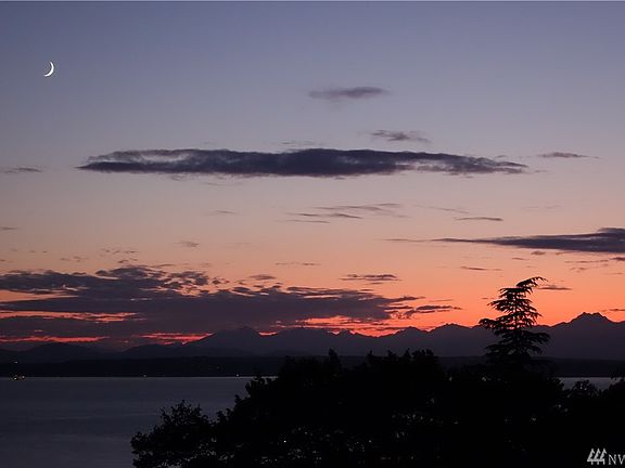 Sunset (and moon) view from the living room, dining room and kitchen 