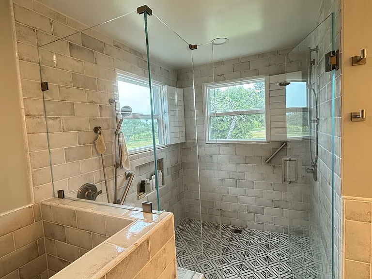 luxurious shower. Two separate Shower stations with views to the Orchard