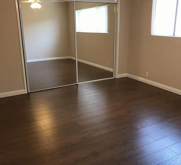 Master bedroom, closet with mirror doors