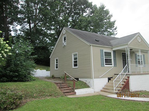 Large front and back yard with fenced dog run