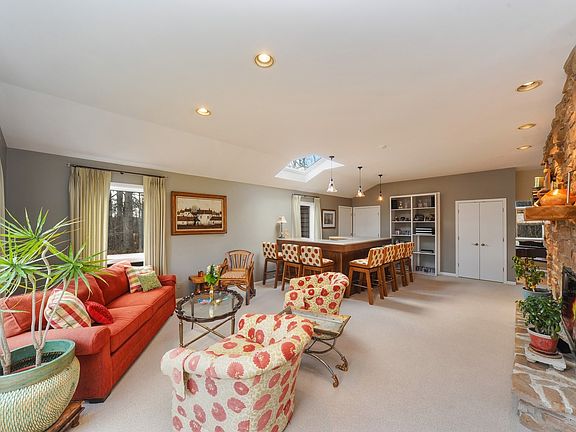 The party starts here! Huge bar and fabulous fireplace is the ultimate.