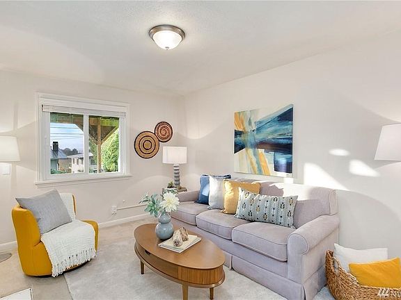 Spacious family room - opposite view Unit is unfurnished - marketing picture only.