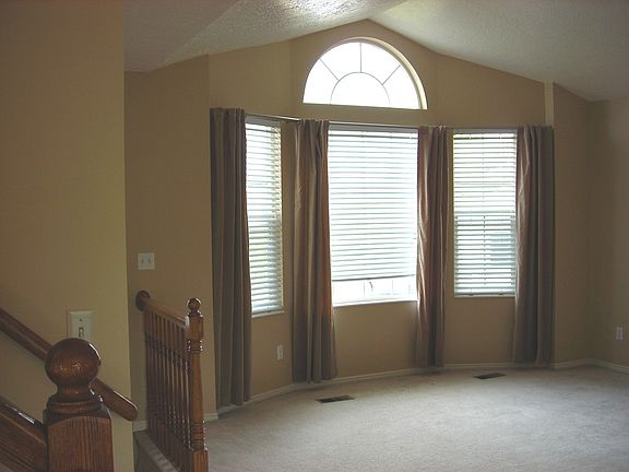 Living Room w/Vaulted Ceiling and Travertine Entry