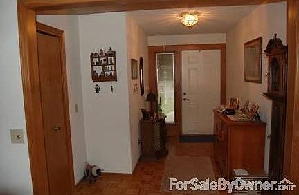Foyer : Wood Floor and guest closet