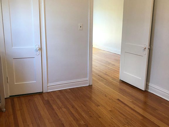 bedroom with closet to the left