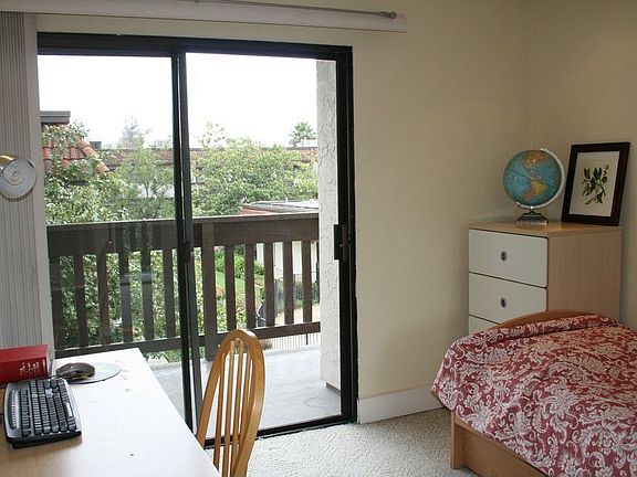 Second bedroom opens to second floor balcony