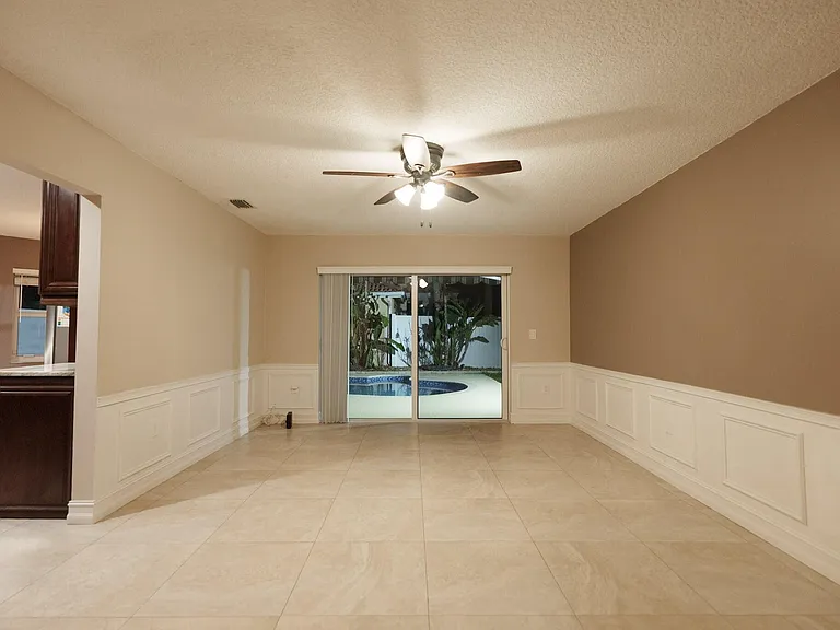 7251 NW 24th Ct — Photo 2