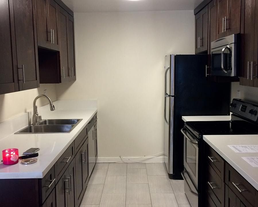 Kitchen has been updated with white cabinets