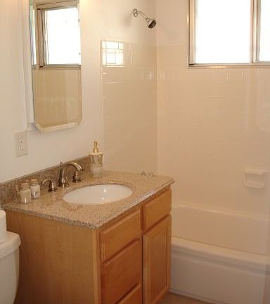 2 Full Baths boasting Granite counters and brushed nickle fixtures 