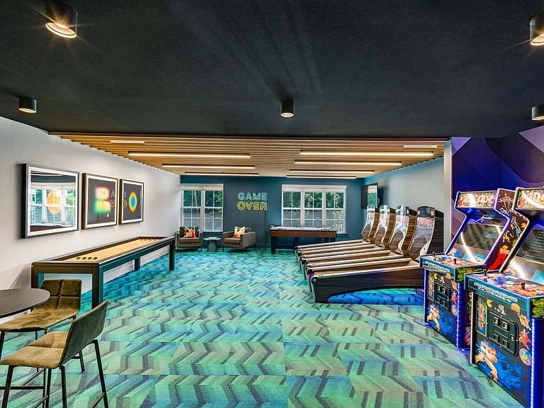 Enjoy leisure time in our game room, which features pool tables and shuffleboards.