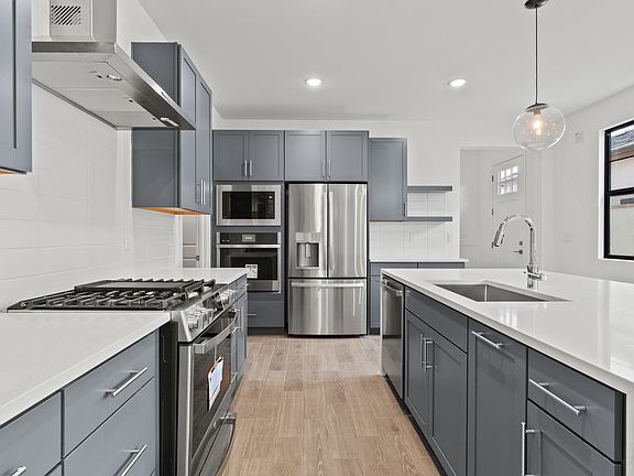 Kitchen with stainless-steel appliances