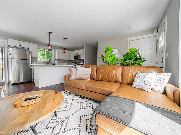 Contemporary open space concept throughout.