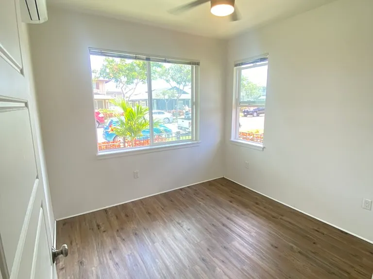 2nd bedroom with split AC and ceiling fan