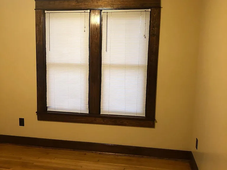 New energy efficient replacement windows with original style trim and 3 / 1 pane windows