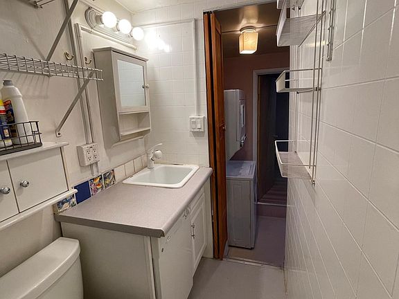 Bathroom looking out from 48x36 shower