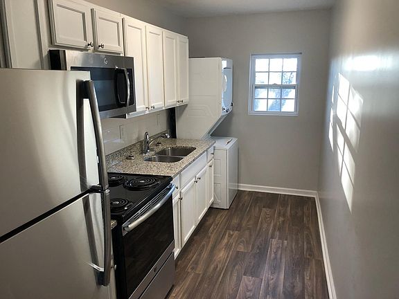 Kitchen with new stainless appliances and granite countertop