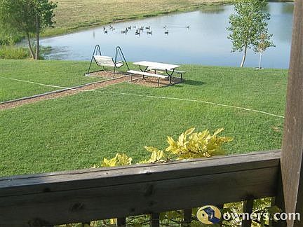 View of the lake & lawn from balcony.
