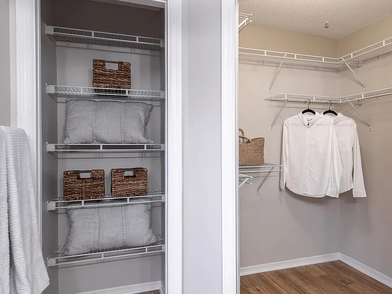 Directly off the master bath, this spacious walk-in closet offers the perfect blend of storage and convenience.