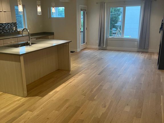 Living room. Newly refurnished white oak hardwood floors