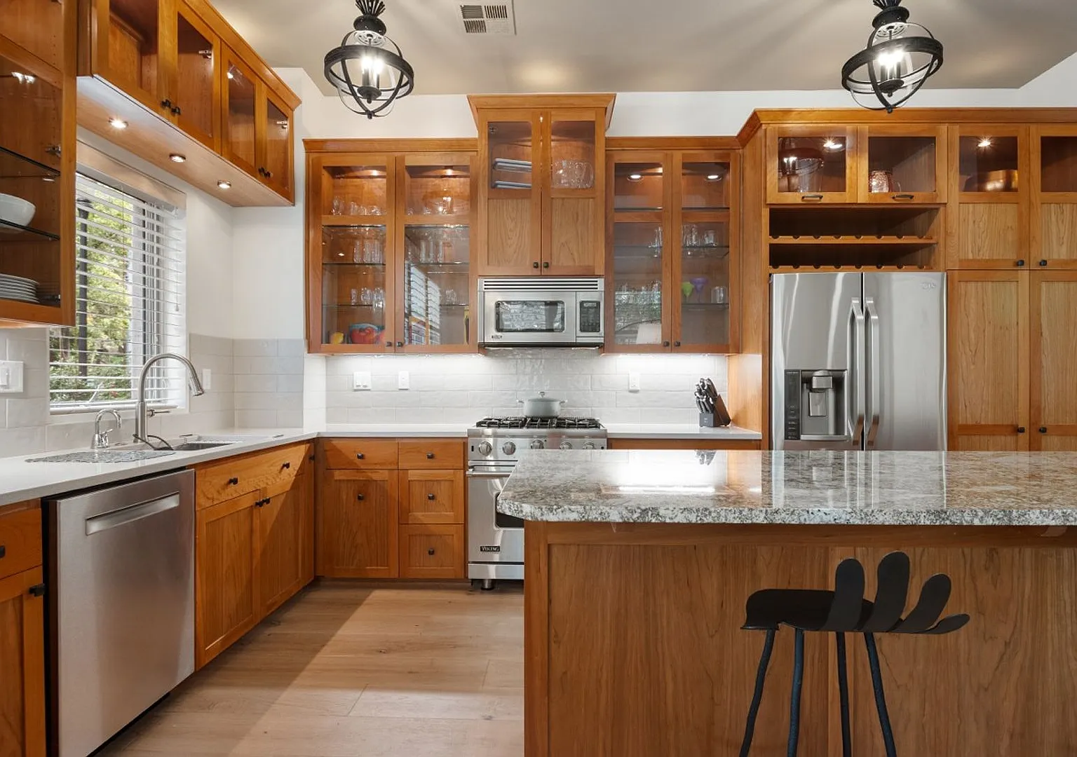 Ground-Floor Corner 2BR + Den at Riverstone Private Courtyard Entrance & Terrace (Pearl District) — Photo 1