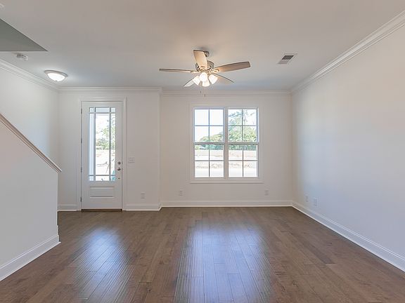 Living room. These photos are for example purposes only. Not exact depiction of floorplan for sale.