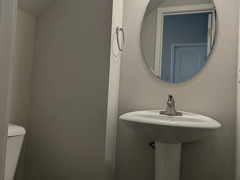 Halfbath by Garage entryway