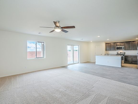 Spacious family room and dining area, with a convenient layout.
