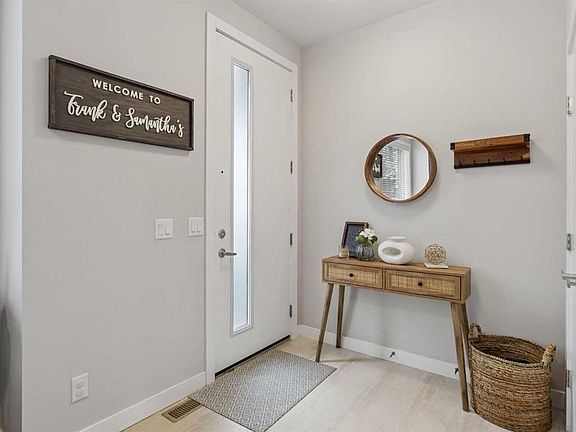 4th image of 704 N Redstone Cres NE
