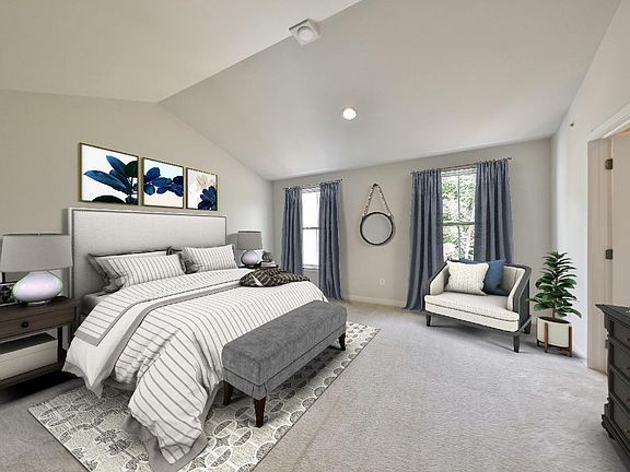 The Primary Bedroom Suite Includes a Private Bath and Large Walk-In Closet