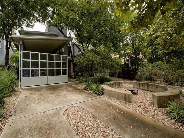 Exterior front with firepit.