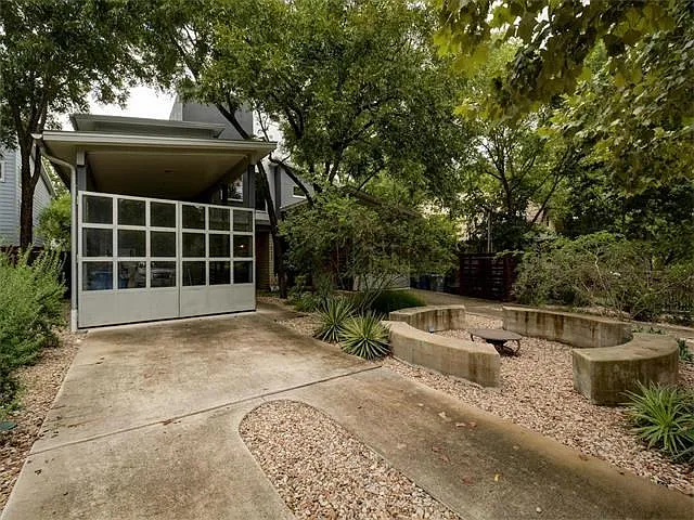 Exterior front with firepit.