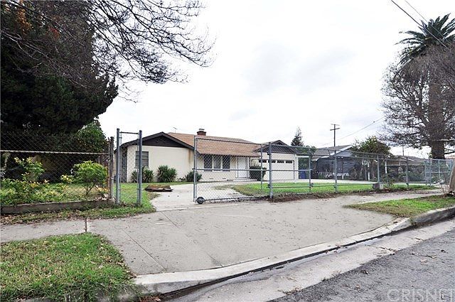 Gated with circular driveway and RV access