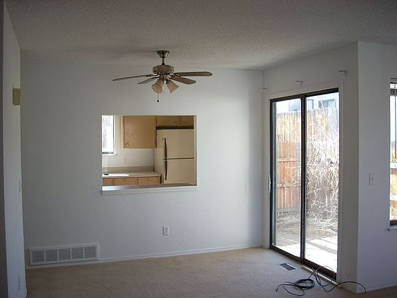 sliding glass doors leading to back patio
