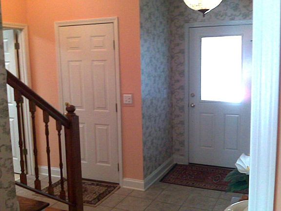 Foyer - stairs lead up to bonus room