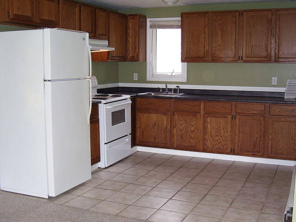 Kitchen with New Refrigerator and young stove in excellent c