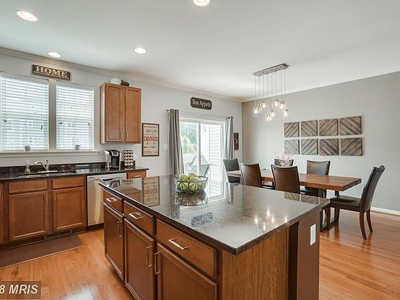 Large Walk-in Pantry with Wood Shelves