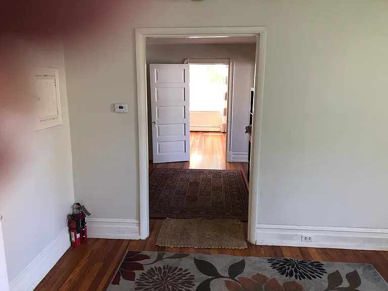 Foyer with master bedroom in background looking from living room.