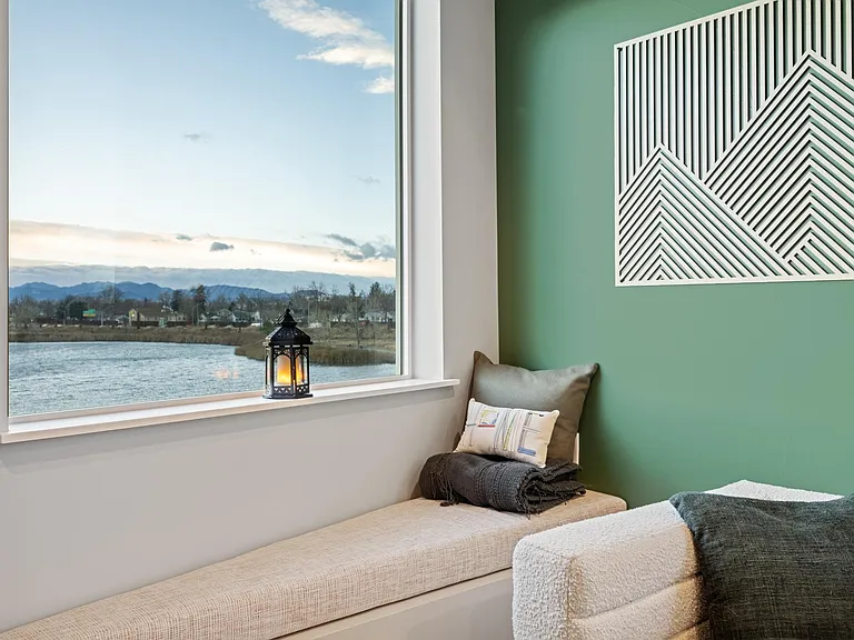 Check out this adorable reading nook! Curl up with a blanket and your favorite hot beverage while you take in the view which is stunning at all times of day. Our rechargeable lanterns add extra ambiance to create the perfect "me-time" moment.