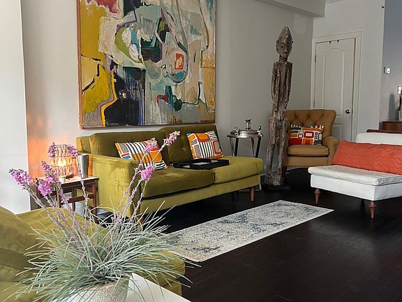 Living room with fireplace and 1/2 bath