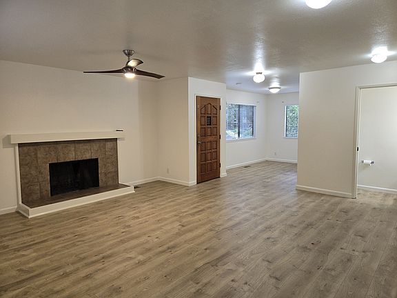 Living room to dining room, including half bathroom