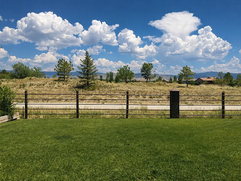 Beautiful Backyard & Mountain Views Relax and enjoy the wide-open views and peaceful setting from your backyard.